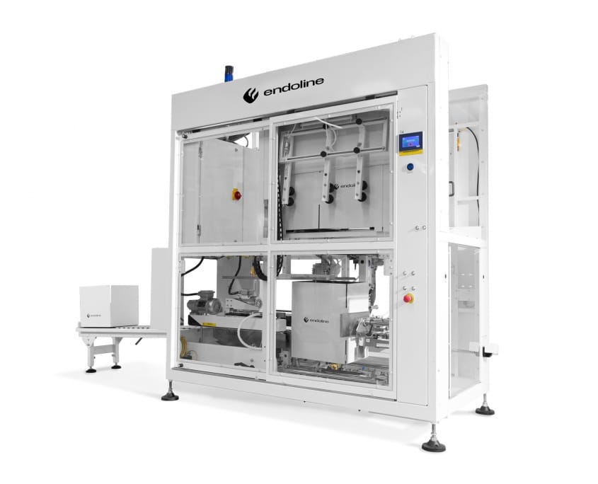 Machine d’emballage automatisée avec enveloppe transparente.
